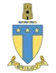Alpha Tau Omega fraternity crest featuring a blue and gold shield with three stars and a bold "T" design, topped by a stone tower, with a gold banner